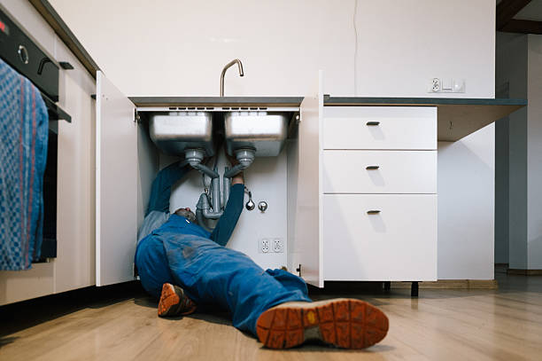 Professional Drain Cleaning technician working in Salem, NH